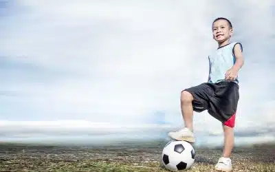 Child Soccer Player On Soccer Field